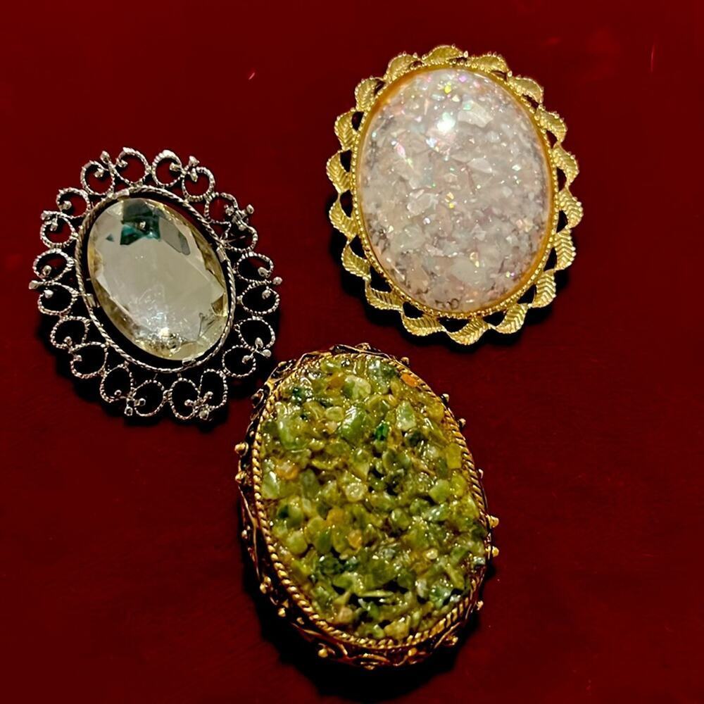 Three vintage brooches